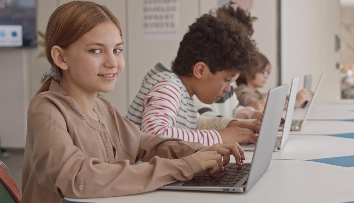 kids-working-at-laptops-at-school
